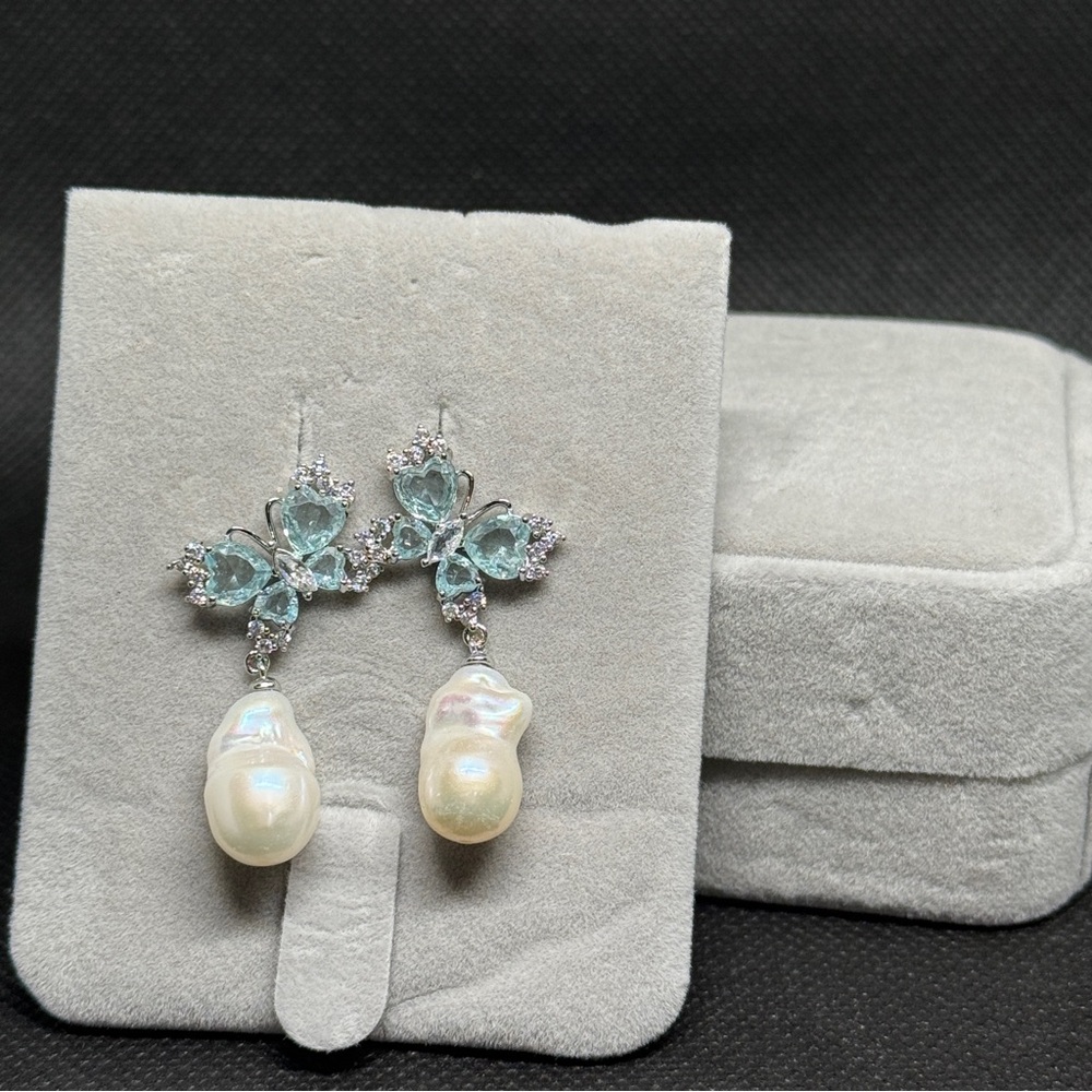 Elegant Silver and Pearl Butterfly Earrings